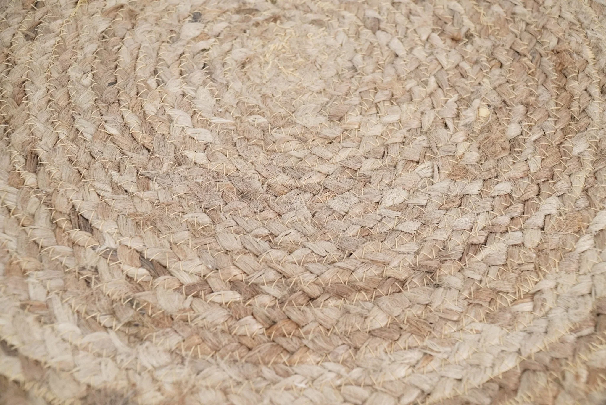 Hand Braided Natural Brown and White Jute Round Pouf - Image 4