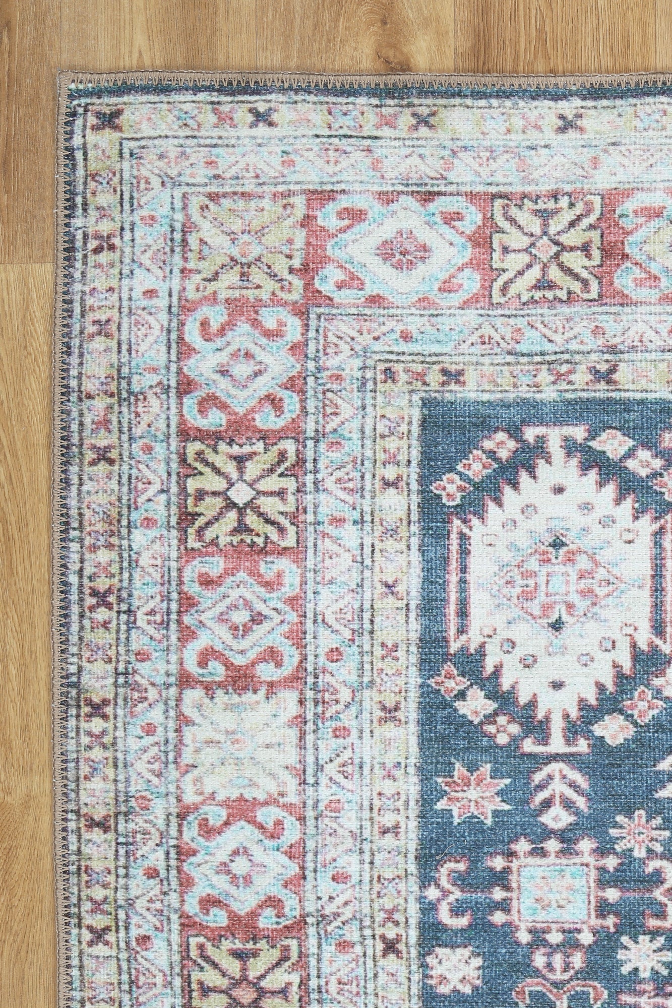 Traditional Machine Washable Blue And Rust Rug - Image 4